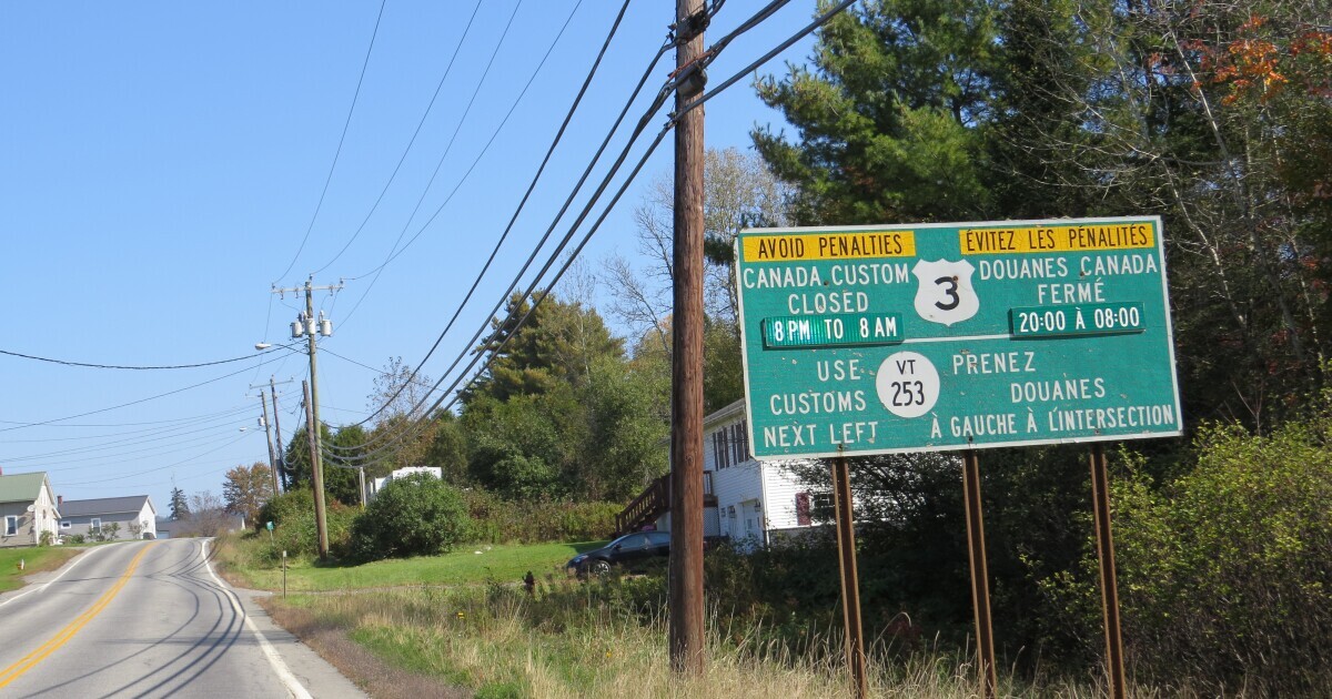 On Route 3 in Stewartstown, New Hampshire, a sign informs motorists about the Canadian customs at the nearby border with Canada. Dan Tuohy photo.