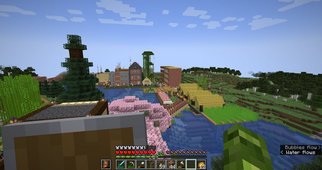 A picture from a nearby mob grinder tower of Trenton showing 2 4 story apartment buildings next to the Northern Cut canal, with a warehouse, market stalls, and 4 shotgun houses next to it. 
