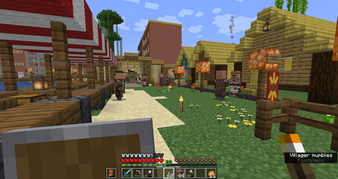 A ground level view with the apartments rising in the distance, but the market stall square has many villager NPCs standing around talking. A sign on a streetlamp has the flag, a wheat bundle on a red field, with a sign that says "Welcome to Trenton" 
