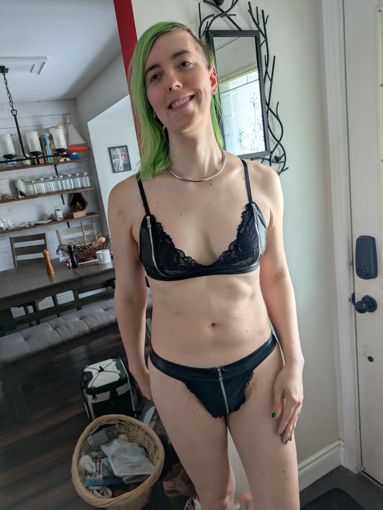 My pet glace right after meeting me outside the front door. She's dressed in only peephole zipper lingerie and she looks smug as fuck about my reaction to it