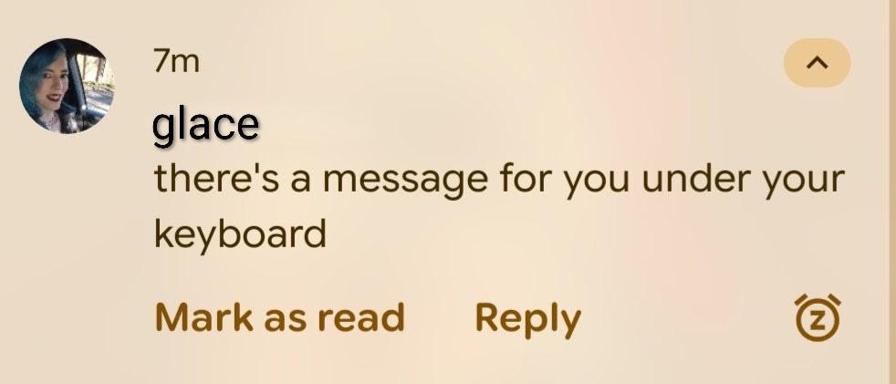 A screenshot of a text message telling me "there's a message for you under your keyboard"